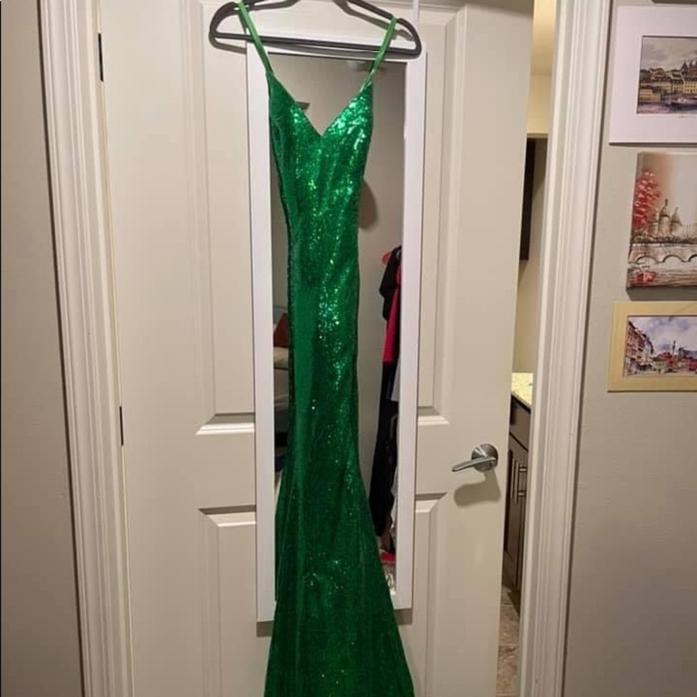 Green sequins gown with train
